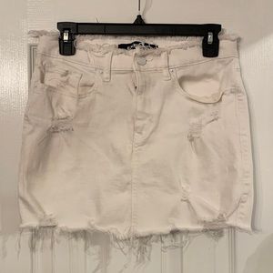 Distressed white denim skirt